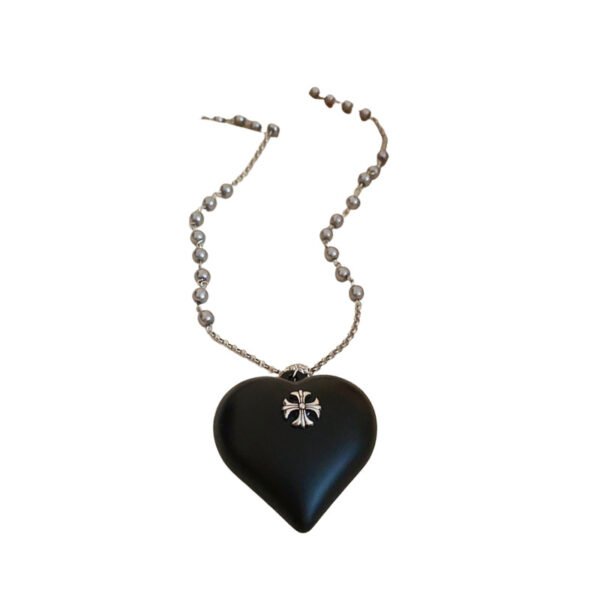 Diamond studded heart-shaped cross pearl necklace